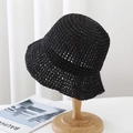 Minimalist black woven straw sun hat for women on a wooden stand with soft natural lighting - 6cm Brim / Black