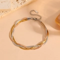 Detailed view of tri-color braided stainless steel bracelet with gold, silver, and rose gold - I808-3 Strand Dotted Blades For Weaving A Three-color Bracelet