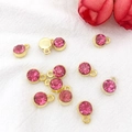Golden round zodiac charms with pink rhinestones for DIY jewelry making and pendants - Gold October - Rose Red