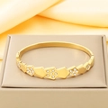 Close-up of geometric 18K gold plated bangle with sparkling zircons on silk background - 60*50mm / Geometric Scale Style (KB210727-KSZ)