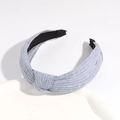 Light gray knitted wide headband with cross knot design on ceramic tray - Light Gray