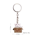 3D cartoon white cat in a brown parcel box keychain with silver metal ring and chain - Keychain / Seeking Adoption White Cat
