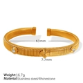 Gold plated stainless steel clover bangle with sparkling white rhinestones and spiral texture - Gold Color Bracelet