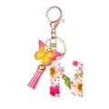 Letter N resin keychain with pink dried flowers, tassel and butterfly pendant decoration - Flower Pattern N