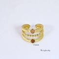 Detail shot of multi-layer 14k gold-plated ring with brown gems weighing 4g - Brown Double Gemstone Multi-loop Style