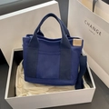 Minimalist blue canvas tote bag with shoulder strap and leather label in gift box - Dark Blue