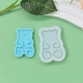 Dettaglio di 2 stampi in silicone a forma di orso per cioccolato e DIY su sfondo verde - Stile Set Solido e Cavo Seduto (1)