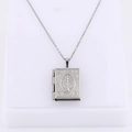 Silver book-shaped locket necklace with tree relief pattern on a white display - Square Christmas Tree/Steel