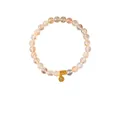 Polished Rutilated Quartz bead bracelet with golden metal charms on white background - Natural Gold Rutilated Quartz Style (WB335)