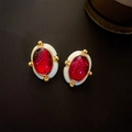 Macro view of vintage oval earrings featuring red gemstone inlay and white enamel detail - Red Drip Oil Oval (16#)
