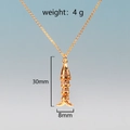 Detail view of gold koi fish pendant with 30mm height and 4g weight measurements - Style 1