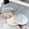 Pink biscuit-shaped portable makeup mirror and Hello Kitty embossed comb set - Creamy Yellow