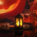 Retro Halloween lantern with LED flickering flame and ghostly silhouette patterns - Pumpkin Ghost Lantern