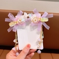 Pair of purple bow hair clips with butterfly accents and long pearl tassel chains - Purple Dragonfly Clips