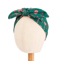 Baby Christmas turban hat with red candy cane print and a large bow on green fabric - Green Candy Cane Print Style (20951)