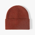 Classic burnt orange ribbed knit beanie for winter outdoor warmth and style - Adjustable / Rust red