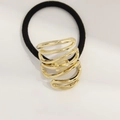 Black elastic hair tie featuring a minimalist golden spiral oval metal ornament - Gold Double W Shape