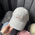Close-up of diverse colors washed canvas baseball caps with premium dog embroidery detail - L (58-61cm) / Bean Green