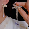 Sparkling bow tassel earrings with white zircons and purple teardrop stones in gold finish - 17#E5387 Gold