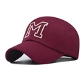 Detail view of burgundy cotton baseball cap featuring ivory 3D letter M embroidery - Burgundy