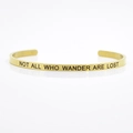 Polished 4mm gold stainless steel cuff bracelet engraved with NOT ALL WHO WANDER ARE LOST - NOT ALL WHO WANDER ARE LOST