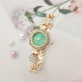 Elegant rose gold women's quartz watch with green dial and sparkling crystal bezel - Rose Gold Case Green Dial