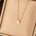 Minimalist rose gold titanium necklace featuring a round bezel-set clear zircon pendant - Rose Gold Round Bezel Set Clear Zircon Necklace (JX072-2)