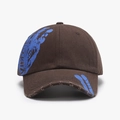 Vintage brown cotton baseball cap with blue graffiti print and distressed brim details - Dark Coffee