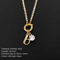 Vergulde roestvrijstalen ketting met letter b en glinsterende kristallen hangers - Letter B / Goud