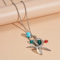 Detalle de collar náutico con estrella de mar plateada, cuentas, concha y dije de corazón - Estrella de Mar Plateada