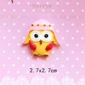 Detail view of yellow resin cartoon owl charm for DIY crafts measuring 2.7x2.7cm - Owl with Pink Hat