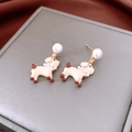 Macro shot of cute cream puppy earrings with pearl collars and sparkling zircon studs - Silver Pin - Beige