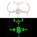 Luminous crystal breast jewels for festivals showing natural and glow-in-the-dark effects - YGXT-01