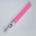 Pink glowing LED light stick for concerts and parties with white handle on white background - Show Round Wand Pink