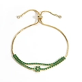 18K gold plated double-row bracelet with green gemstones and flower charms on white backdrop - Gold Green Zirconia