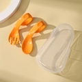 Orange baby training fork and spoon set with ergonomic handles in a clear storage box - Vibrant Orange With Storage Box