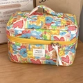 Gesteppte Kosmetiktasche mit bunten Zeichentrick-Doodles und Tragegriff für Reisen - Frühlings-Doodle-Kosmetiktasche