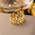 Polished 18K gold olive leaf open ring featuring adjustable design on a dark background - Hammered Olive Leaf Style (F188)