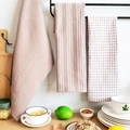 Close-up of pink waffle weave cotton kitchen towels hanging in a minimalist Nordic kitchen - Coffee Tea Towel 3-Piece Set / 45*65cm