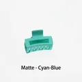Detail of a small matte cyan hollow rectangular hair claw clip for a minimalist look - Matte Cyan