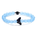 Sky blue beaded bracelet with dark blue star sand bead and elegant fishtail pendant - Blue Chalcedony + Blue Sandstone Butterfly