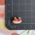 Detailed view of mini resin strawberry bread charm on a ruler showing 1.5cm width - Double Red Strawberry Bread