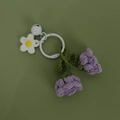 Handmade crochet lily of the valley keychain featuring purple flowers and white bell charm - Purple Lily of the Valley