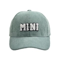 Close-up of MINI embroidery detail on a light green corduroy texture baseball cap - MINI Style / Fruit Green