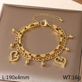 Gold double-layered stainless steel bracelet with diamond-set hollow heart charms - Zirconia Hollow Heart Bohemian Style (KB203676-Z)