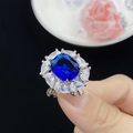 Elegant silver cocktail ring with large cushion-cut blue sapphire and pear diamonds - Adjustable Open Ring