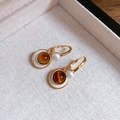 Macro detail of vintage gold hoop earring with amber gemstone and pearl on linen tray - 12# Brown Gold Real Gold Plated Ear Clip