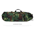 Dettaglio della borsa da skateboard mimetica impermeabile con tasca e tessuto nylon - 110cmX32cm / Grande Camouflage Verde