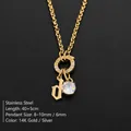 Collar de acero inoxidable chapado en oro de 14K con letra 'd' y cristal - Letra D / Dorado