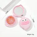 Cute pink peach foldable hair brush with mirror and massage bristles for kids - Pink Sausage Lips Folding Mirror Brush